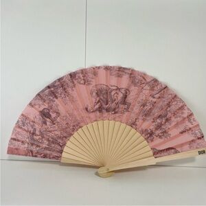 Dior gift holding fan